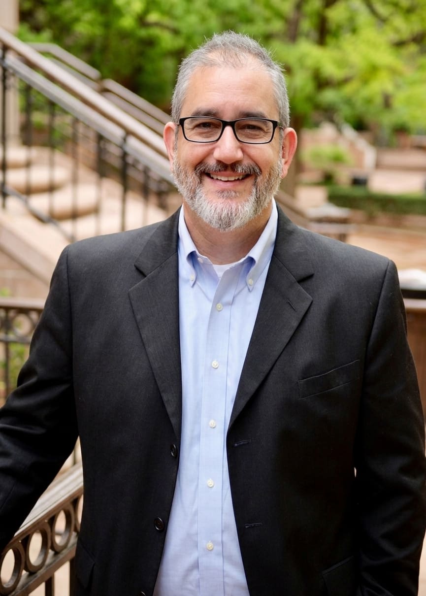 Portrait of Andy Brenits Standing In Courtyard